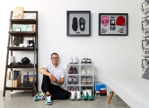  ?? Dave Chan, © The New York Times Co. ?? Former Shopify chief technology officer Jean-michel Lemieux with his shoe collection­s at his home in Ottawa, Canada, on Sept. 23. Shopify’s job, he said, is to slow down bots to a human level.