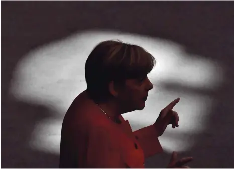  ?? FOTO: AFP ?? Angela Merkel bei einer Rede im Bundestag. Die Kanzlerin gerät parteiinte­rn immer mehr unter Druck.