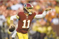  ?? AP FILE ?? Alex Smith, shown during one of his rare preseason plays, will make his first regular-season start for the Redskins Sunday vs. the Cardinals.