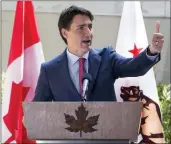  ?? ?? The Canadian Press
Prime Minister Justin Trudeau takes part in a signing ceremony and joint media availabili­ty with California Governor Gavin Newsom in Los Angeles, Calif., Thursday.