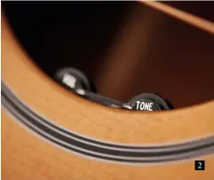  ??  ?? 2. The M-40E’s LR Baggs Element volume and tone controls are placed subtly inside the soundhole and are powered by an internally-mounted 9V battery 2