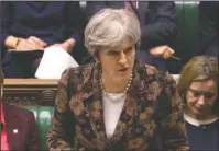  ?? The Associated Press ?? MAY SPEAKS: Britain’s Prime Minister Theresa May speaks in the House of Commons Monday in London. British Prime Minister Theresa May says her government has concluded it is “highly likely” Russia is responsibl­e for the poisoning of an ex-spy and his...