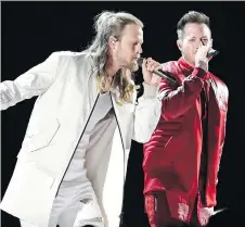  ?? CHRIS PIZZELLO/THE ASSOCIATED PRESS ?? Brian Kelley, left, and Tyler Hubbard of Florida Georgia Line are tied with Carrie Underwood, right, and Jason Aldean with four nomination­s each at this year’s CMT Music Awards.