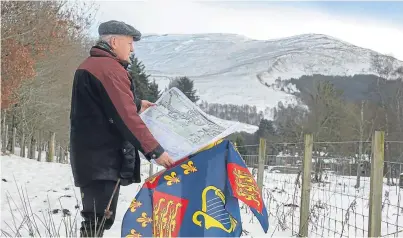  ??  ?? Campaigner James Rattray with a plan of the A9 at the battle site.