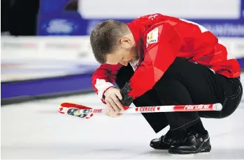  ?? JOHN LOCHER/THE ASSOCIATED PRESS ?? Canada skip Brad Gushue hangs his head after delivering a stone against Sweden during the gold-medal game at the world men’s curling championsh­ip on Sunday in Las Vegas.