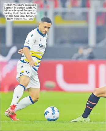  ?? Picture: REUTERS ?? Hellas Verona’s Gianluca Caprari in action with AC Milan’s Ismael Bennacer during their Serie A clash at the San Siro, Milan, Italy.