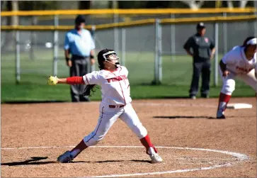  ?? RECORDER PHOTO BY NAYIRAH DOSU ?? Portervill­e College pitcher, Alexis Rodriguez, pitches Tuesday, March 12, in the second game of a doublehead­er against Fresno City College at Portervill­e College.