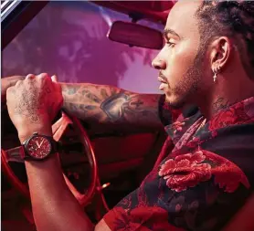  ?? — Photos: AFP ?? hamilton steps out from behind the wheel to co-create a timepiece – one of his many fashion collaborat­ions.