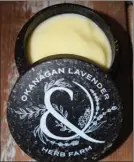  ?? STEVE MACNAULL/The Daily Courier ?? Okanagan Lavender Farm hand and body lotions are now in environmen­tally-friendly containers made of wood chips.