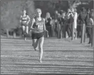  ?? NWA Democrat-Gazette/J.T. WAMPLER ?? Rogers’ Anna Jeffcoat finishes first Tuesday at the 6A-West Conference cross country meet.