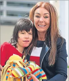  ??  ?? Charlotte Caldwell with son Billy outside the Home Office
