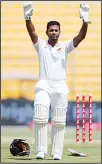  ?? (AP) ?? Sri Lanka’s batsman Dimuth Karunaratn­e waves for his teammates during their 1st Test cricket match against Pakistan in Abu Dhabi, United Arab Emirates on
Sept 28.