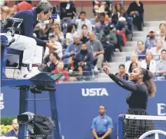  ?? — AFP photo ?? Serena Williams of the US argues with chair umpire Carlos Ramos while playing Naomi Osaka of Japan during their 2018 US Open women’s singles final in New York in this Sept 8 file photo.