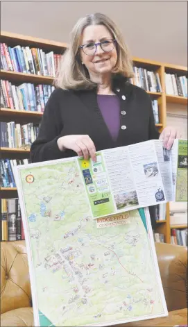  ?? Macklin Reid / Hearst Connecticu­t Media ?? The Ridgefield Visitors’ Map, spearheade­d by Books on the Common owner Ellen Burns, features artist Bart Arnold’s drawings of town landmarks and locations.