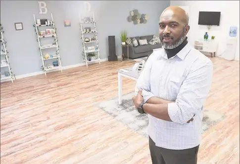  ?? Hearst Connecticu­t Media file photo ?? Jonathan Mickens at Your CBD Store’s location in Danbury in March. Your CBD Store is listed in the business directory on shopblackc­t.com.