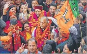  ?? ?? Union minister Anurag Thakur and ex-CM Jai Ram Thakur during a BJP road show; and (below) CM Sukhwinder Singh Sukhu during Congress’ poll campaign in Shimla.
HT FILE PHOTOS