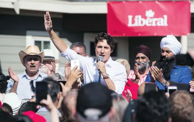  ??  ?? Prime Minister Justin Trudeau was met by anti-pipeline activists at a Liberal Party barbecue in Delta on Sunday. — THE CANADIAN PRESS