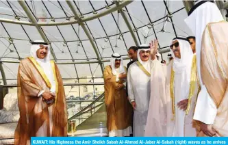  ?? — KUNA ?? KUWAIT: His Highness the Amir Sheikh Sabah Al-Ahmad Al-Jaber Al-Sabah (right) waves as he arrives at Kuwait internatio­nal airport. Sheikh Sabah returned home yesterday after undergoing medical tests in the United States.