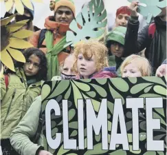  ?? ?? Protesters gather outside the COP26 venue on the last day