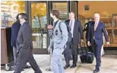  ?? KRISTINA DAVIS U-T ?? Defendants in the “Fat Leonard” Navy bribery trial leave San Diego court in April. The trial is ongoing.