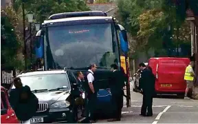  ??  ?? Disaster tourists: Passengers get back on the coach after the stop