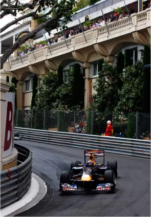  ??  ?? Monaco master: Webber twice took his Red Bull to Monte Carlo wins