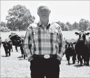  ?? PHOTOS BY STACI VANDAGRIFF/RIVER VALLEY & OZARK EDITION ?? Jerry Duvall, 70, has been farming for more than 50 years. He operates a cow/calf operation, as well as three poultry houses, on his land in Hattievill­e.