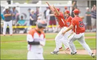  ?? Matthew Brown / Hearst Connecticu­t Media ?? Cheshire pitcher Ben DeLaubell (11) celebrates following the Rams’ 1-0 win over Ridgefield in the CIAC Class LL baseball finals at Palmer Field Stadium on Saturday in Middletown. Cheshire defeated Ridgefield 1-0.