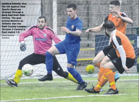  ?? Picture: Paul Amos FM4995576 ?? Ashford Athletic find the net against Deal Sports Reserves (orange) through a back heel from Dale Horton. The goal proved decisive as Athletic won the Kent County League, Division 3 Central & East match 1-0