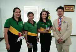  ??  ?? Mr. Jacky Fong with one of their trusted partners from LandBank