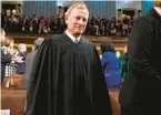  ?? JACQUELYN MARTIN/GETTY ?? Chief Justice of the United States John Roberts attends the State of the Union address on Feb. 7, in the House Chamber of the U.S. Capitol in Washington, D.C.