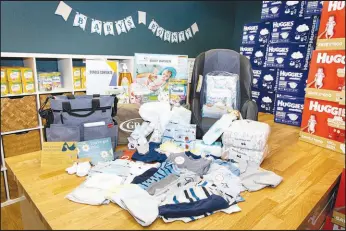  ?? ?? A baby bundle for new mothers is seen on display during a facility tour at Baby’s Bounty.