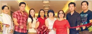  ??  ?? At the inaugurati­on of Maricielo Villas are DMCI Homes VP for project developmen­t, Alma Florendo (third from left) and VP for DPMC, Anna Marie Ferrer (third from right) cut the ribbon to formally open the Maricielo Villas model units in Madrid building...