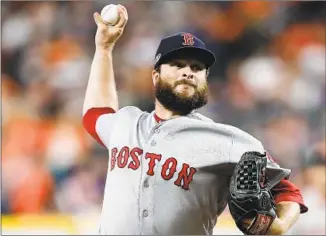  ?? Elsa Garrison Getty Images ?? RYAN BRASIER has yielded only 19 hits and seven walks while striking out 29 in 34 major-league games this season with Boston. Brasier became even more effective during the playoffs.