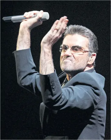  ?? REUTERS ?? George Michael performs on the first night of the British leg of his tour at the MEN Arena in Manchester in 2006.