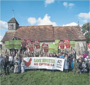  ?? ?? Binsted, Walberton and Fontwell villagers campaignin­g against the bypass at Binsted church