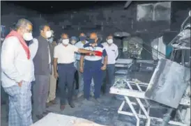  ?? PTI ?? Maharashtr­a home minister Anil Deshmukh inspects the Bhandara General Hospital ward where the fire broke out on Saturday.