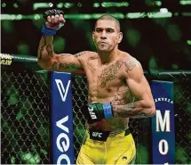  ?? Frank Franklin II/Associated Press ?? Brazil’s Alex Pereira, who trains at Teixeira MM & Fitness in Bethel, will defend his light heavyweigh­t title for the first time on Saturday against Jamhal Hill at UFC 300 in Las Vegas.