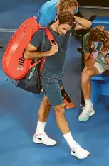  ?? GETTY IMAGES ?? Roger Federer walks off court after his fourth round loss to Greece’s Stefanos Tsitsipas at the Australian Open in Melbourne earlier this week.