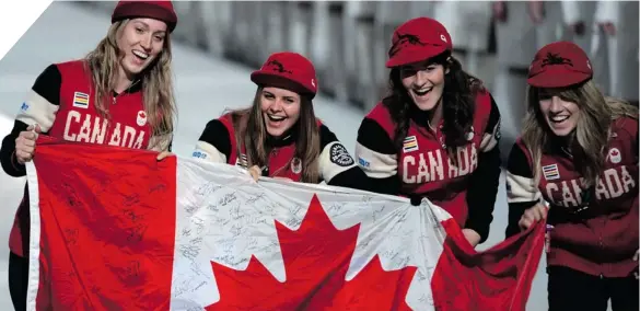  ?? PETER PARKS/ AFP/ GETTY IMAGES ?? PARTY TIME Canada’s athletes let loose and whooped it up as they paraded during a celebratio­n of the Games during the closing ceremony Sunday, one of the beautiful aspects of the Olympics.