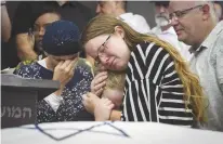  ?? (Flash90) ?? FAMILY AND FRIENDS attend the funeral in Lod of Rina Shnerb, 17, who died in a bomb terror attack near Dolev in 2019.