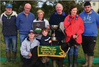  ??  ?? Kerry Aboo is pictured here with his owners and the Fuller family after winning the Stephan Fuller Cup at Kilflynn coursing last Sunday. Photo by David O’Sullivan