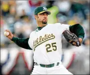  ?? KIRTHMON F. DOZIER / TNS ?? Esteban Loaiza had a 126-114 career record in 14 seasons in the major leagues. He earned $43.7 million while pitching for nine teams.