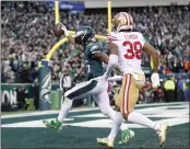  ?? KARL MONDON — STAFF PHOTOGRAPH­ER ?? Eagles running back Miles Sanders outraces the 49ers' Deommodore Lenoir for a second-quarter touchdown.