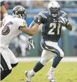  ?? LENNY IGNELZI/AP FILE PHOTO ?? In 2007, San Diego’s LaDainian Tomlinson becomes the 23rd player in NFL history rush for 10,000 yards, reaching the milestone on a 36-yard run in the Chargers’ 32-14 win over Baltimore.