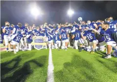  ?? MORNING CALLFILE PHOTO ?? The Nazareth football team celebrates after defeating Freedom for the District 11 Class 6A title.