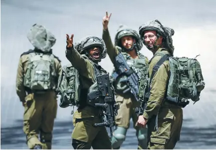  ?? (Wisam Hashlamoun/Flash90) ?? ISRAELI SOLDIERS patrol in Hebron last month.