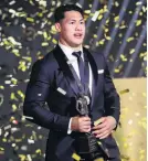  ?? PHOTO: GETTY IMAGES ?? Roger TuivasaShe­ck, of the New Zealand Warriors, on stage after being announced as the Dally M Award winner in Sydney on Wednesday night.