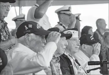  ?? MENGSHIN LIN AP ?? Pearl Harbor survivors Harry Chandler (left), Ken Stevens, Herb Elfring and Ira “Ike” Schab attend the 82nd Pearl Harbor Remembranc­e Day ceremony Thursday in Honolulu, Hawaii.