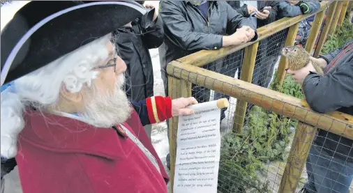  ?? GREG MCNEIL/CAPE BRETON POST ?? Town Crier Ken Carmichael read the proclamati­on on Friday after Two Rivers Tunnel made his annual weather prediction at Two Rivers Wildlife Park.